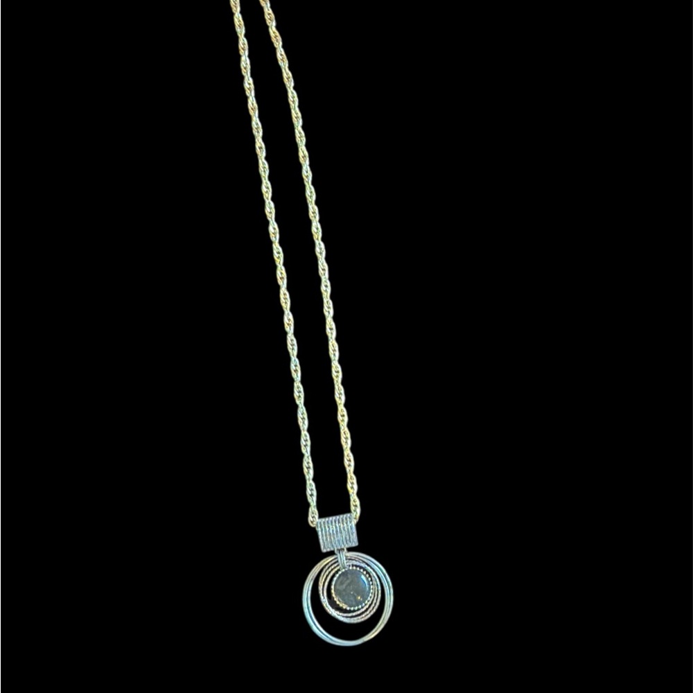 Elegant Gold and Silver Pendant Necklace